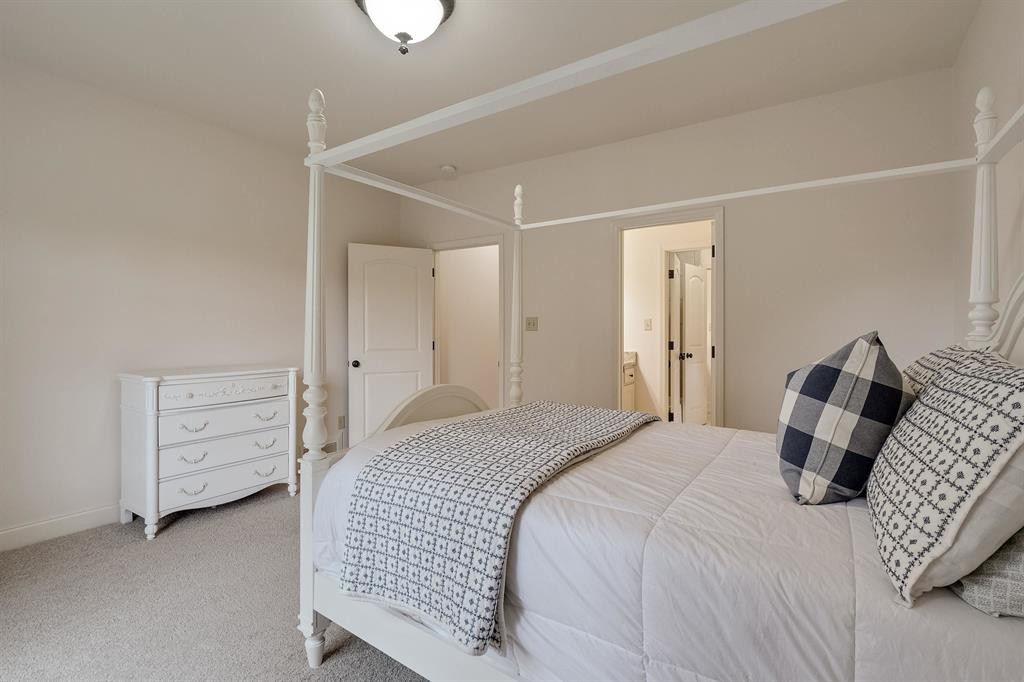 1185 Braystone Trail Collierville, TN 38017 - Photo 22 of 39 a bedroom with a bed and a cabinets