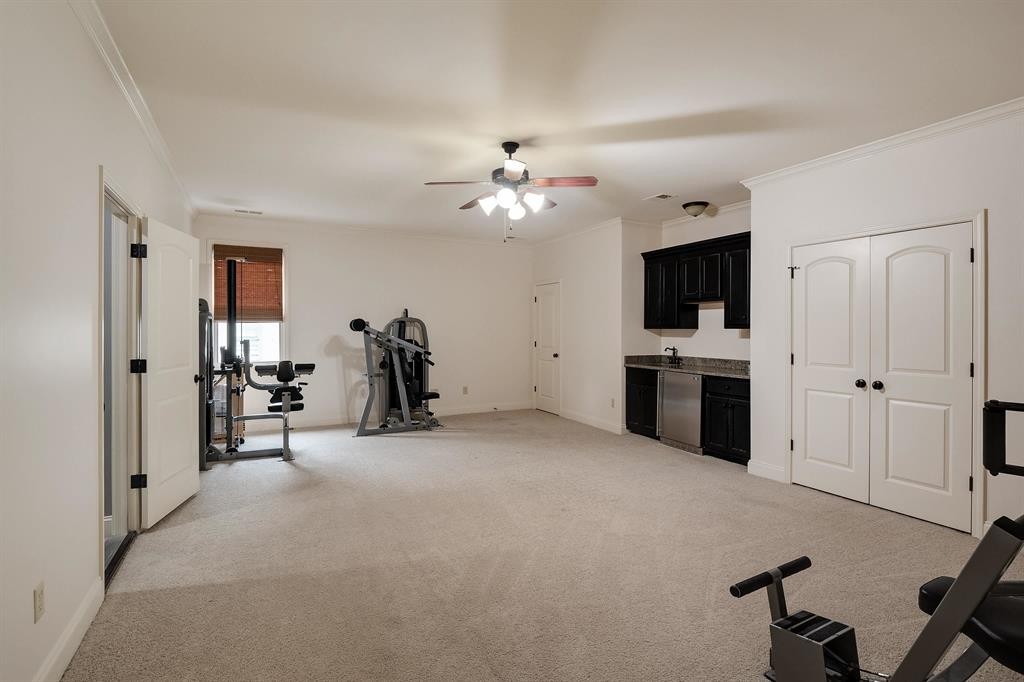 1185 Braystone Trail Collierville, TN 38017 - Photo 23 of 39 a living room with furniture and a flat screen tv