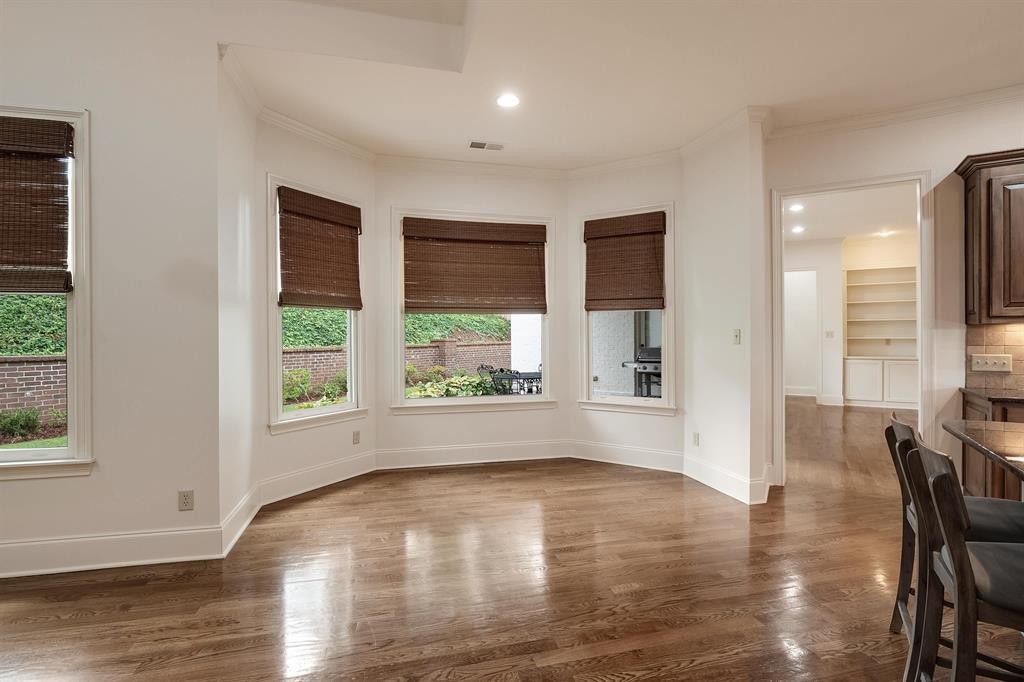 1185 Braystone Trail Collierville, TN 38017 - Photo 7 of 39 a view of empty room with wooden floor and fan