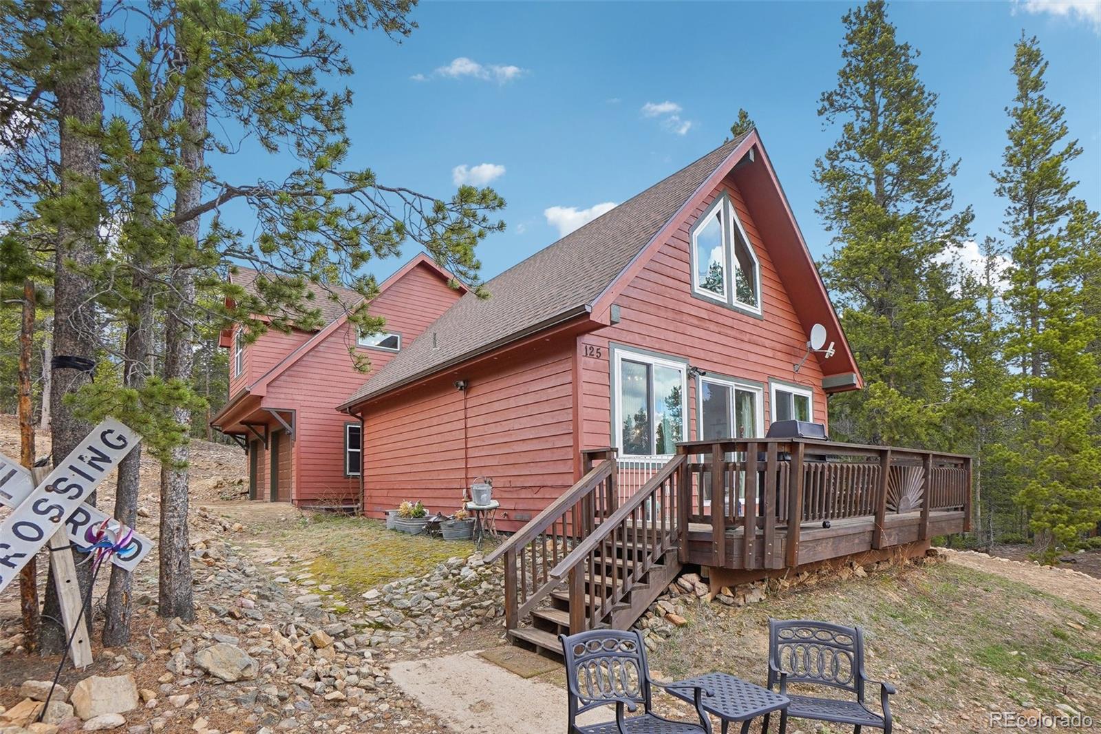 125 Aspen Road Black Hawk, CO 80422 - Photo 3 of 44 a view of a house with a yard