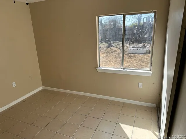 an empty room with a window