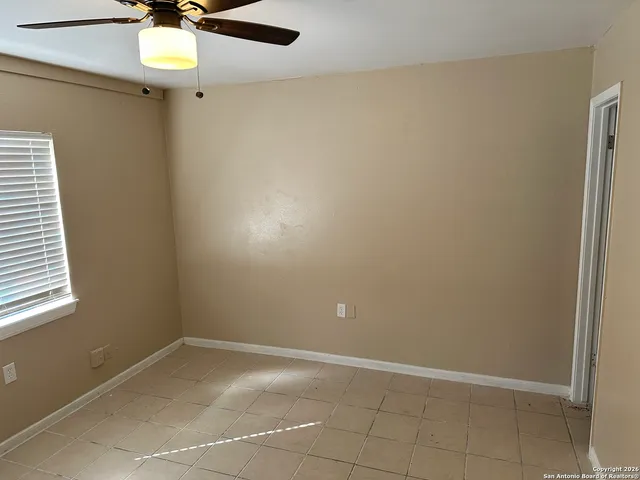 an empty room with a window