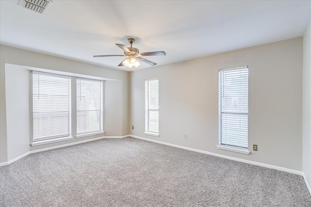 2938 River Crest Road Corpus Christi, TX 78415 - Photo 19 of 39 a view of an empty room with a window