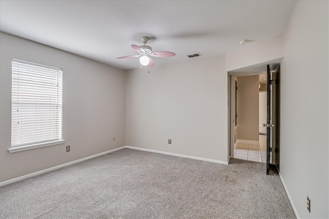 2938 River Crest Road Corpus Christi, TX 78415 - Photo 27 of 39 a view of an empty room with a window