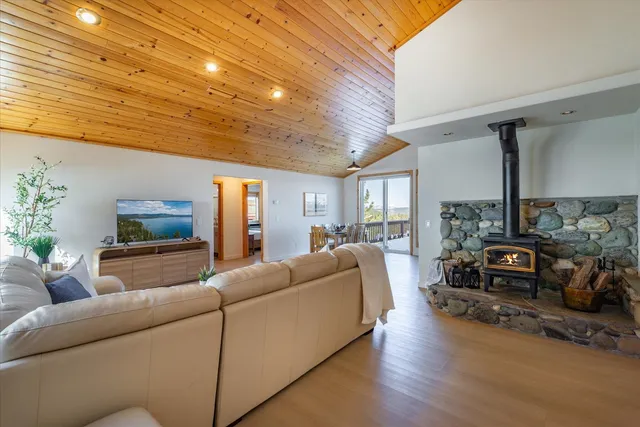 a kitchen with a sink stove and microwave