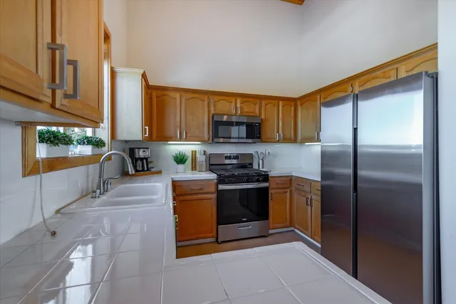 a bathroom with a window and a sink