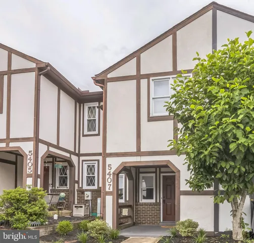 front view of a house with a street
