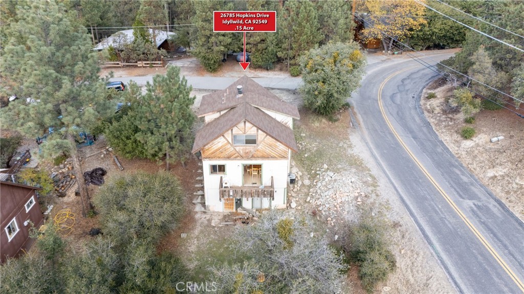 26785 Hopkins Road Idyllwild, CA 92549 - Photo 11 of 46 a front view of a house with a yard