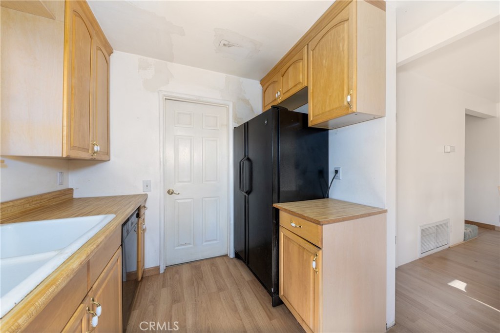 26785 Hopkins Road Idyllwild, CA 92549 - Photo 21 of 46 a utility room with a sink a washer and dryer