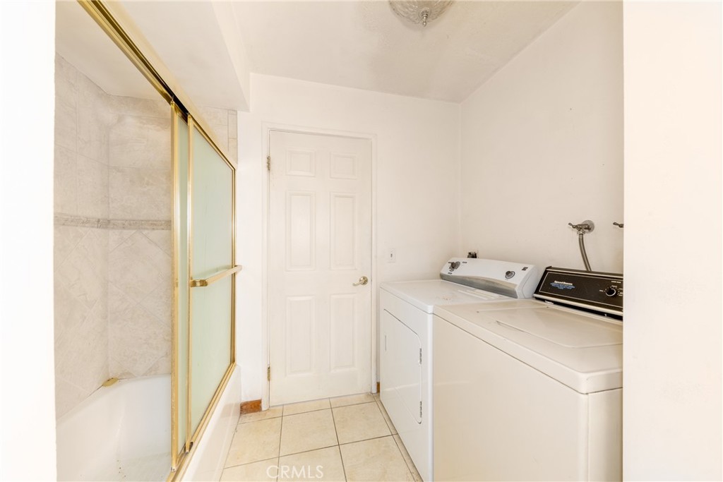 26785 Hopkins Road Idyllwild, CA 92549 - Photo 22 of 46 a utility room with dryer and washer