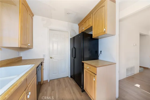 a bathroom with a sink toilet vanity and tub