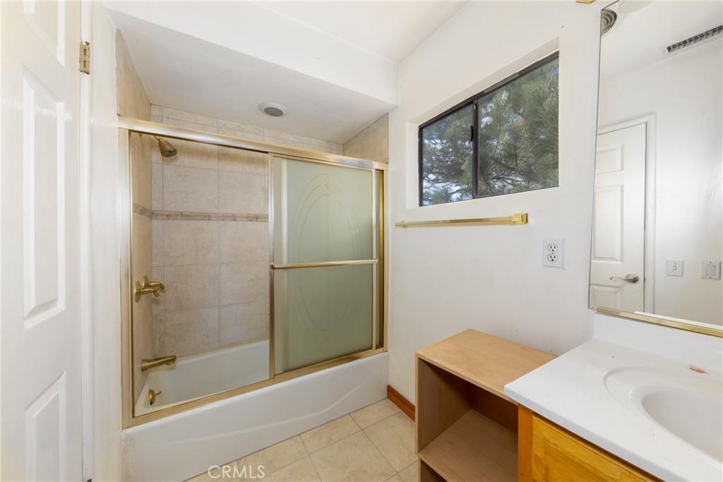 26785 Hopkins Road Idyllwild, CA 92549 - Photo 27 of 46 a bathroom with a sink and a shower