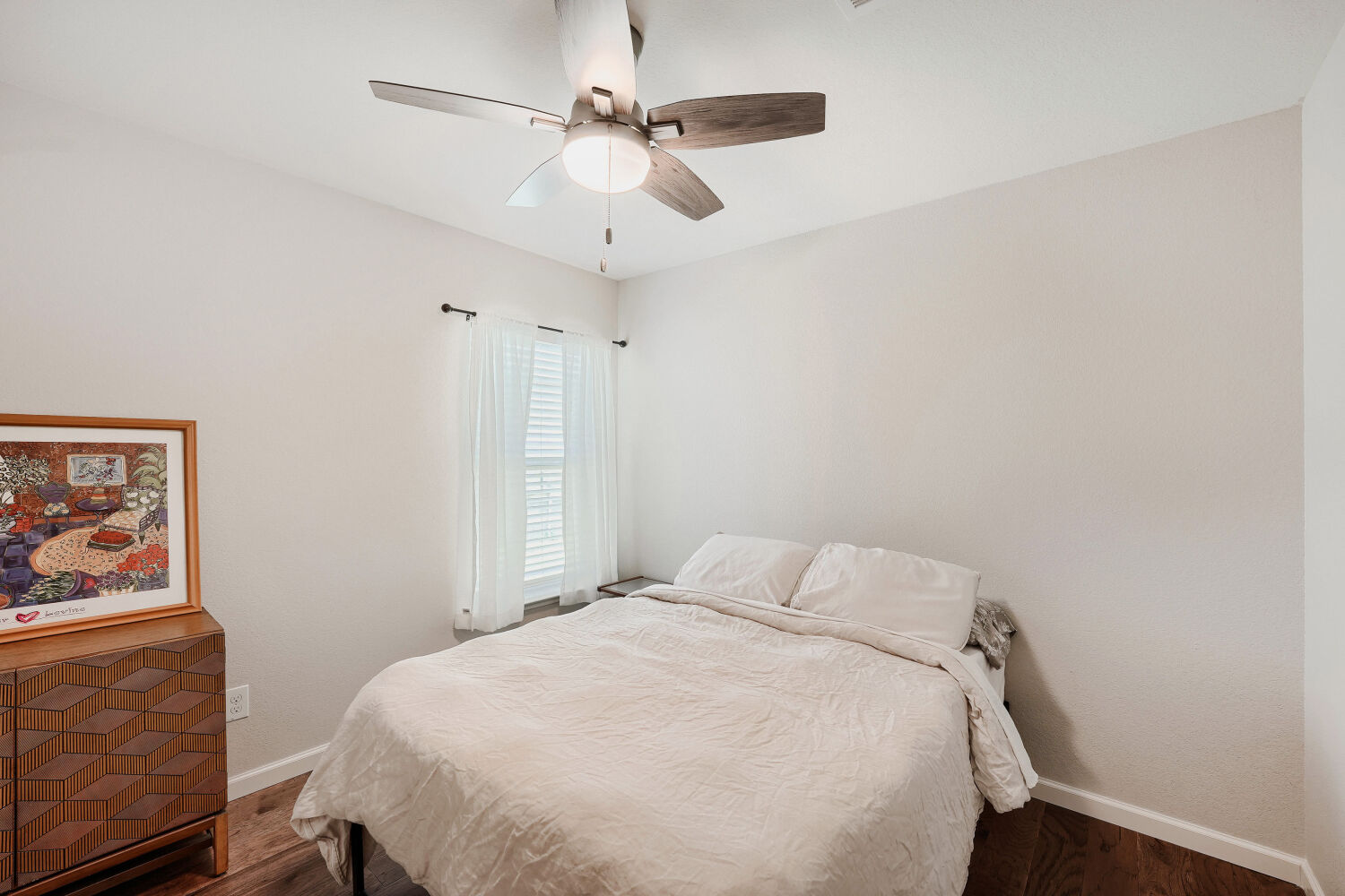 116 Millers Loop Jarrell, TX 76537 - Photo 15 of 23 A comforting retreat, this secondary bedroom offers a restful atmosphere for relaxation.