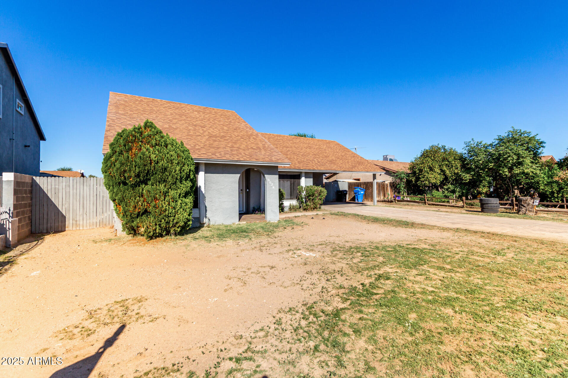 a house with trees in the background
