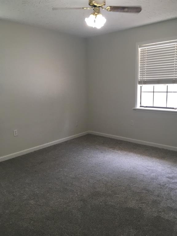 13403 Highway 157 Haughton, LA 71037 - Photo 14 of 40 an empty room with a empty space and windows