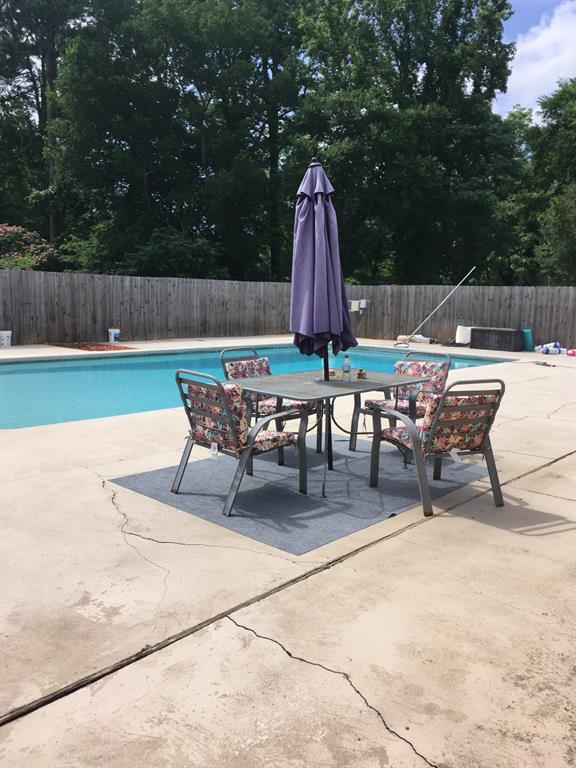 13403 Highway 157 Haughton, LA 71037 - Photo 29 of 40 a view of backyard with swimming pool and outdoor seating