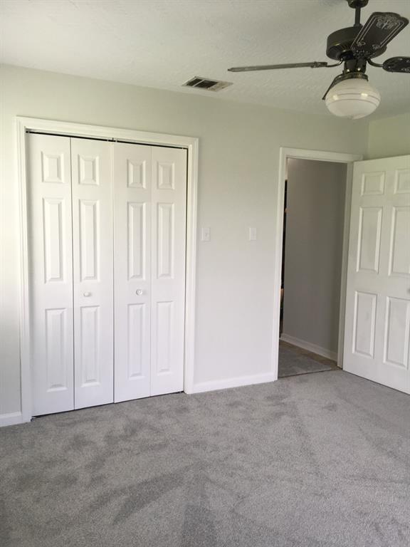 13403 Highway 157 Haughton, LA 71037 - Photo 7 of 40 a view of a livingroom with a chandelier fan