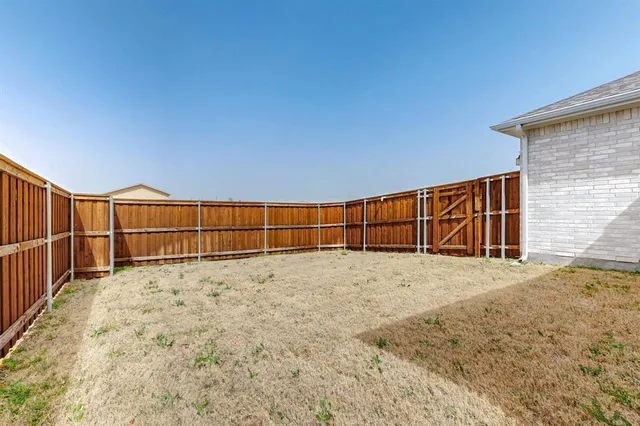 a picture of a bathroom with a shower