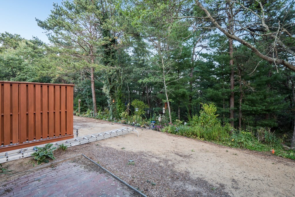 4 Shellback Way, Unit A4 Mashpee, MA 02649 - Photo 26 of 30 a view of backyard with green space