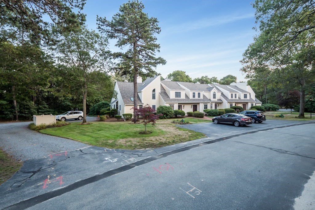 4 Shellback Way, Unit A4 Mashpee, MA 02649 - Photo 28 of 30 a view of street with parked cars