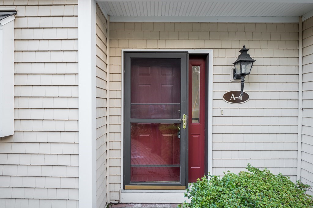 4 Shellback Way, Unit A4 Mashpee, MA 02649 - Photo 3 of 30 a bathroom with a shower and a sink