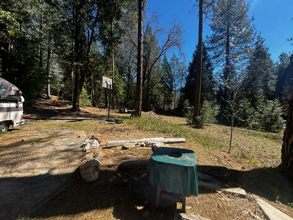a stove top oven sitting inside of a kitchen