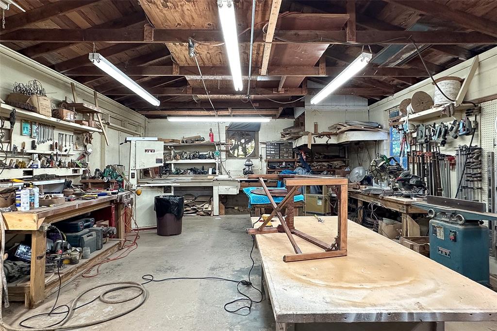 3751 Southeast 3rd Avenue Ocala, FL 34480 - Photo 96 of 100 a view of a kitchen with stainless steel appliances granite countertop a stove a sink and a island