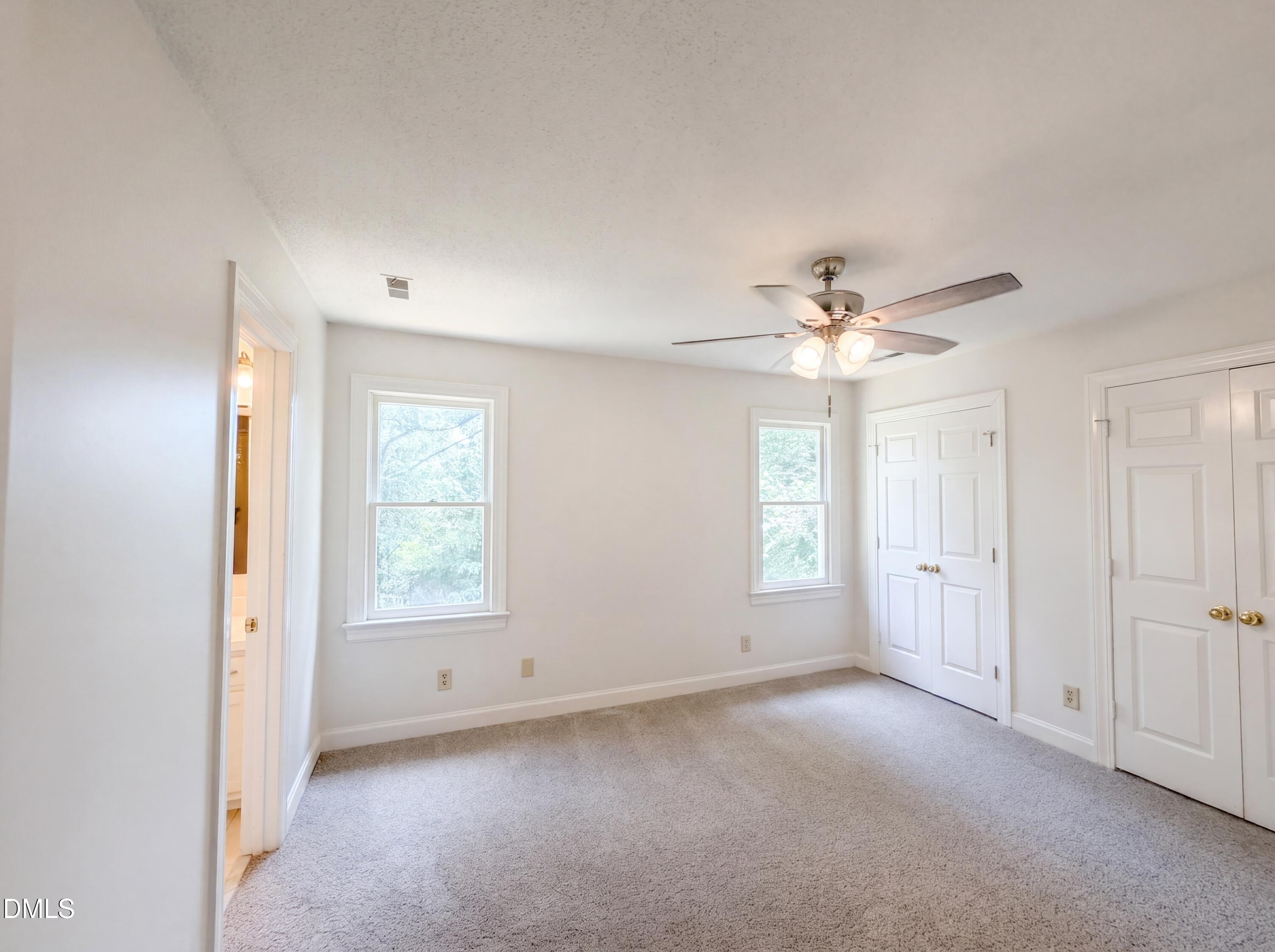 3921 Iron Horse Road Raleigh, NC 27616 - Photo 6 of 20 a view of an empty room with a window