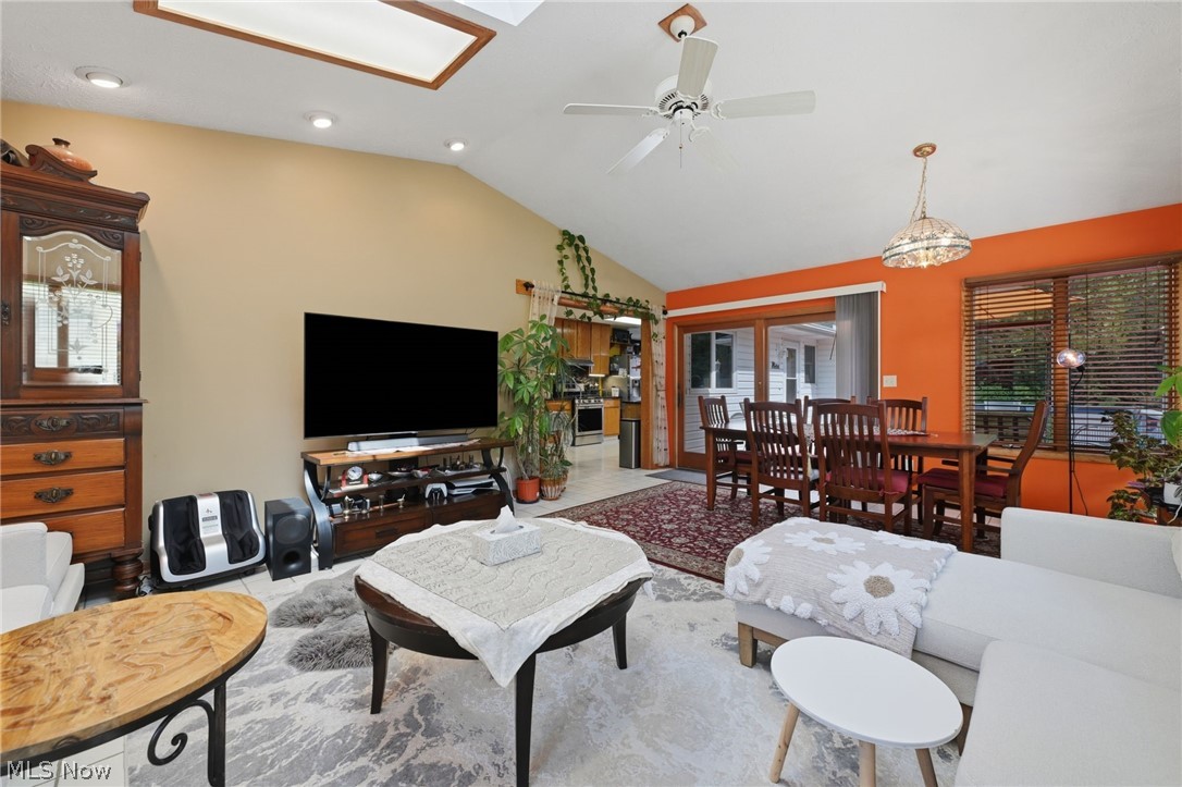 1499 Morris Road Kent, OH 44240 - Photo 20 of 41 Vaulted ceiling living space with recessed lighting and skylight, featuring light-toned walls and an open concept layout