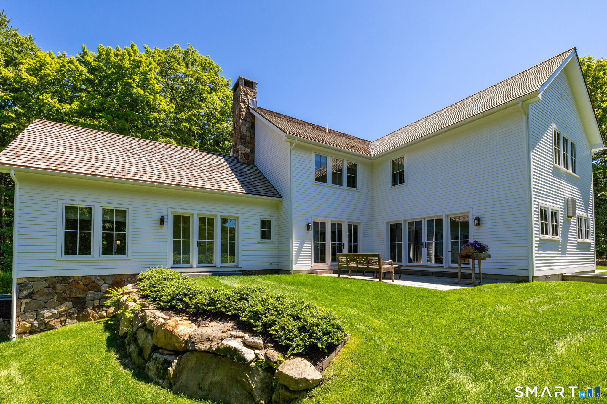 631 Milton Road Litchfield, CT 06759 - Photo 38 of 40 SOUTH TERRACE AND BACK OF HOUSE