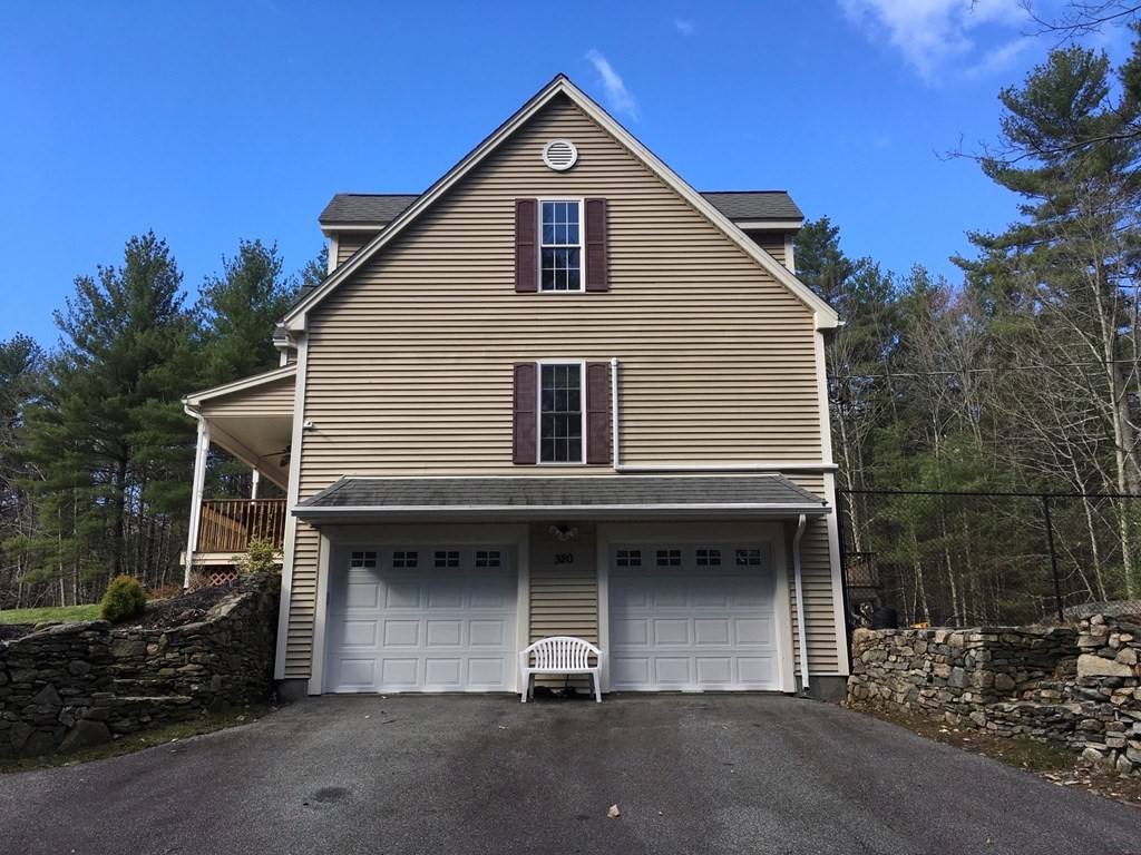 320 Putnam Hill Road Sutton, MA 01590 - Photo 3 of 40 a house view with a outdoor space