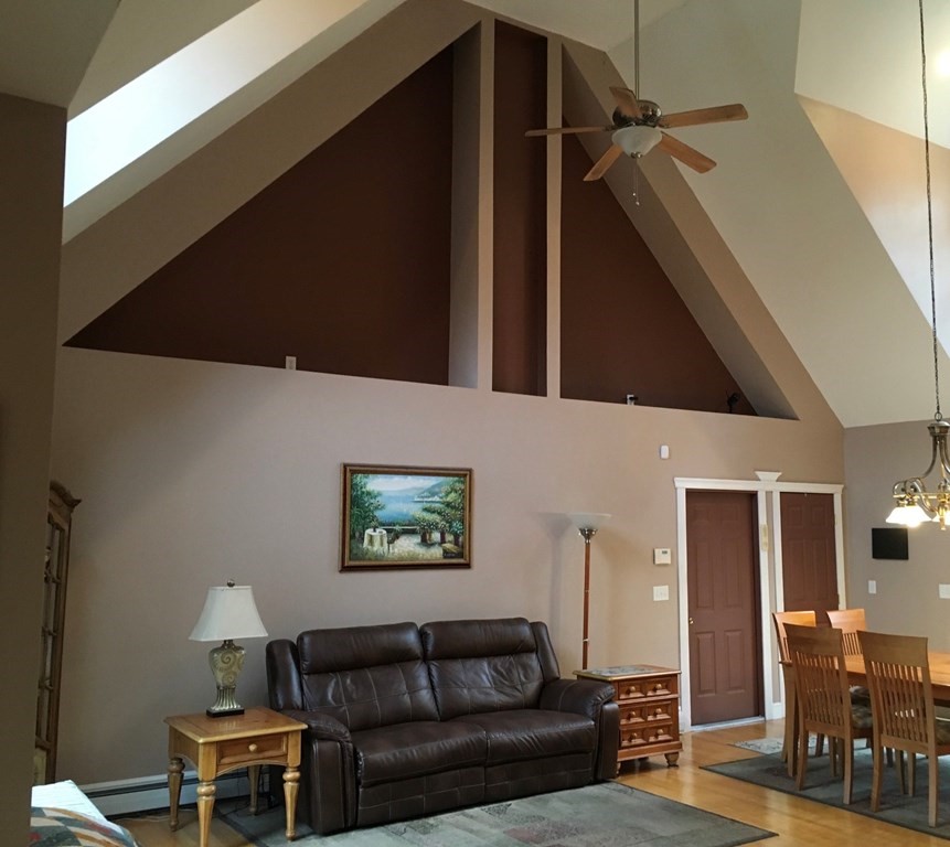 320 Putnam Hill Road Sutton, MA 01590 - Photo 9 of 40 a living room with furniture