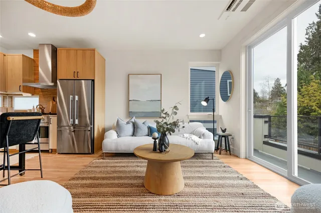 a living room with furniture and a rug