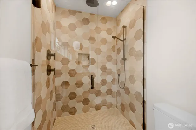 a bathroom with a shower curtain