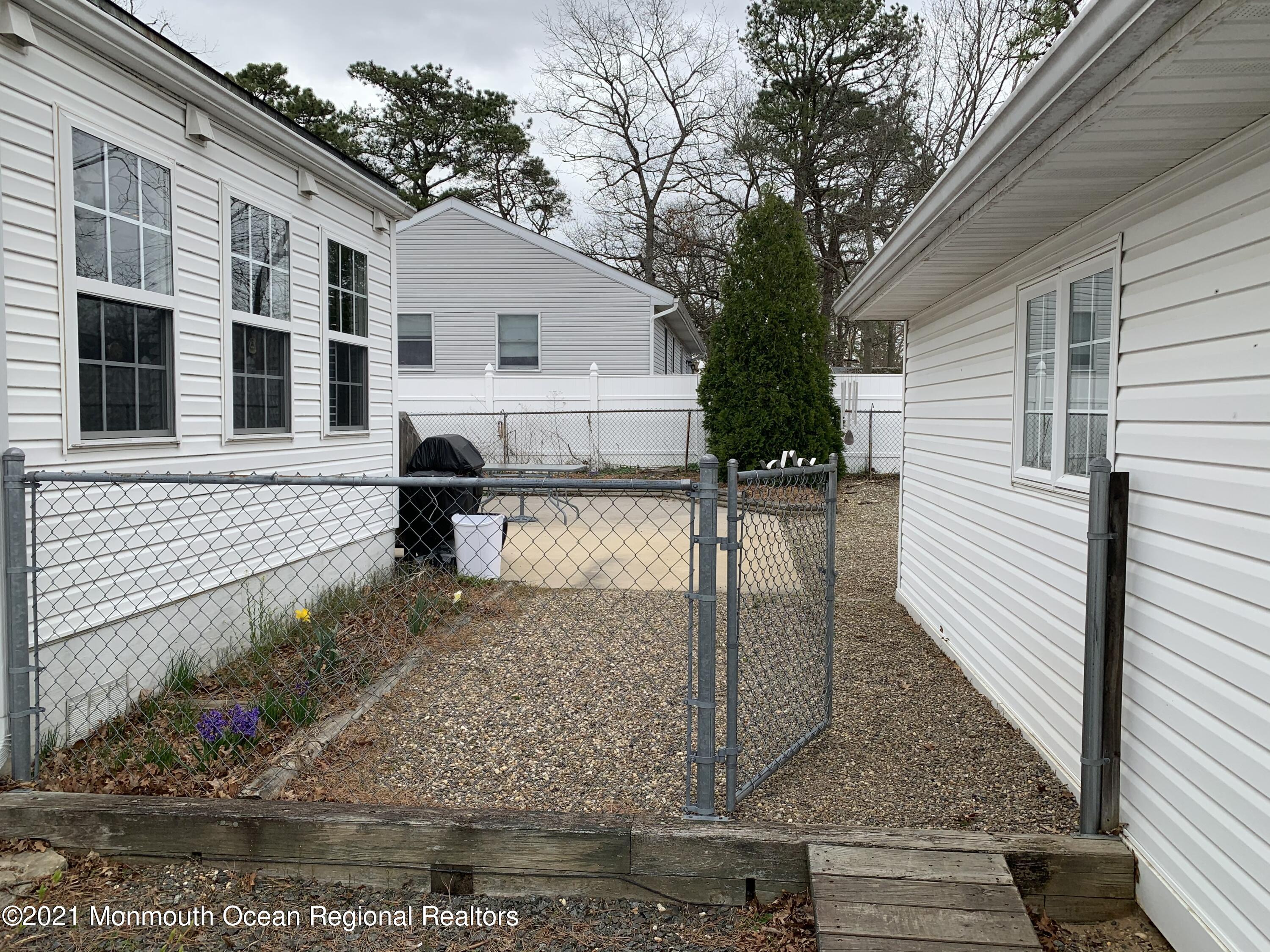 105 Seaspray Road Manahawkin, NJ 08050 - Photo 8 of 25 a view of backyard of the house