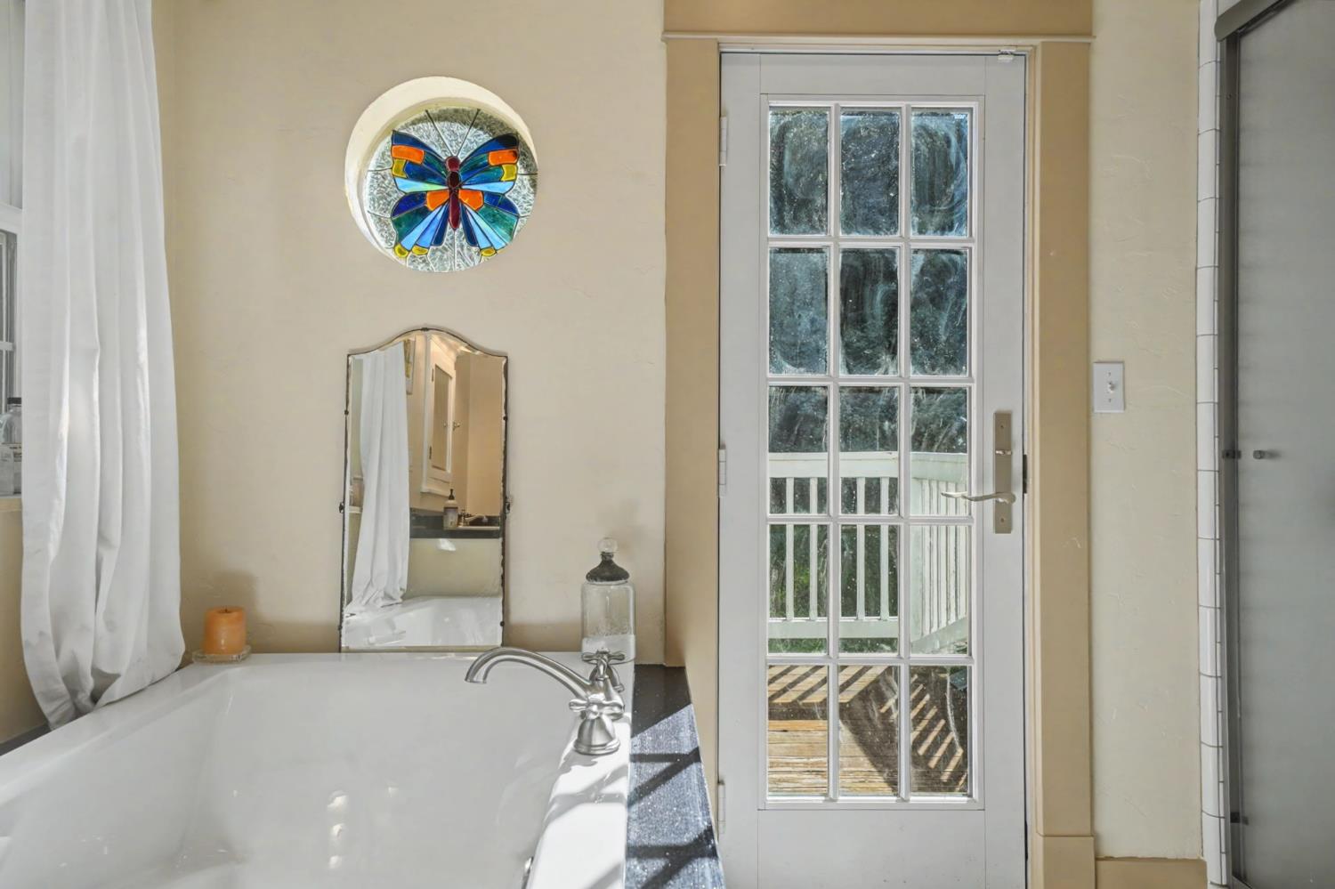 14232 Sutter Creek Road Sutter Creek, CA 95685 - Photo 41 of 57 SOAKING TUB AND FRENCH DOOR TO PRIVATE BACLONY