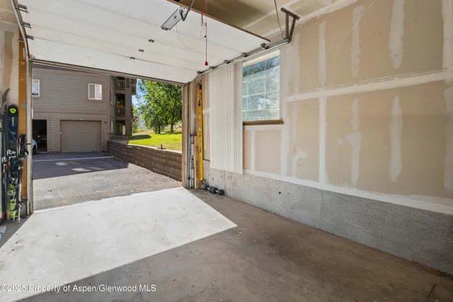 a view of a house with a garage