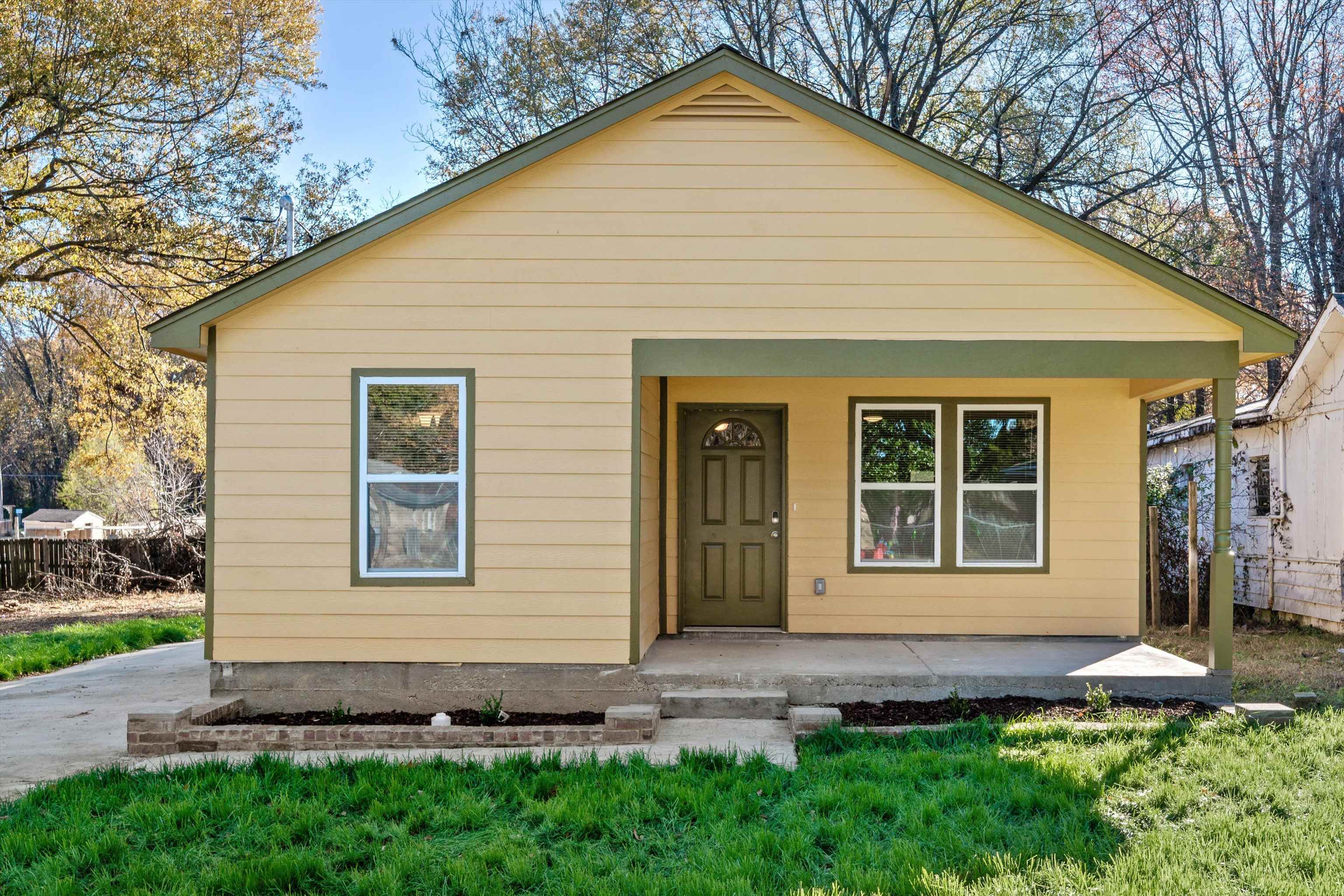 487 Delta Road Memphis, TN 38109 - Photo 1 of 25 a front view of a house with a yard
