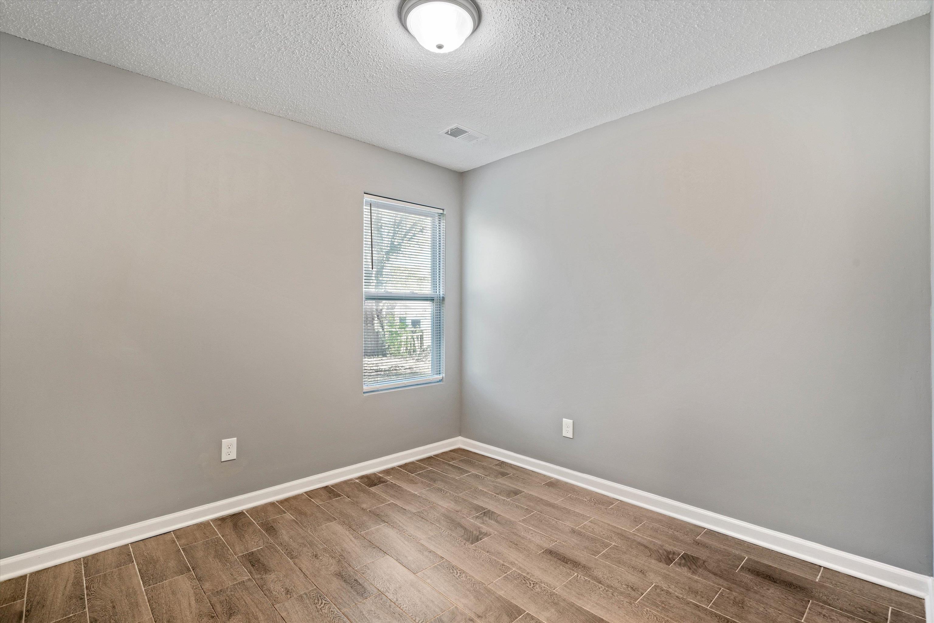 487 Delta Road Memphis, TN 38109 - Photo 20 of 25 an empty room with a window