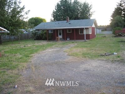 2216 Edmonds Avenue Northeast Renton, WA 98056 - Photo 1 of 1 a front view of a house with a yard