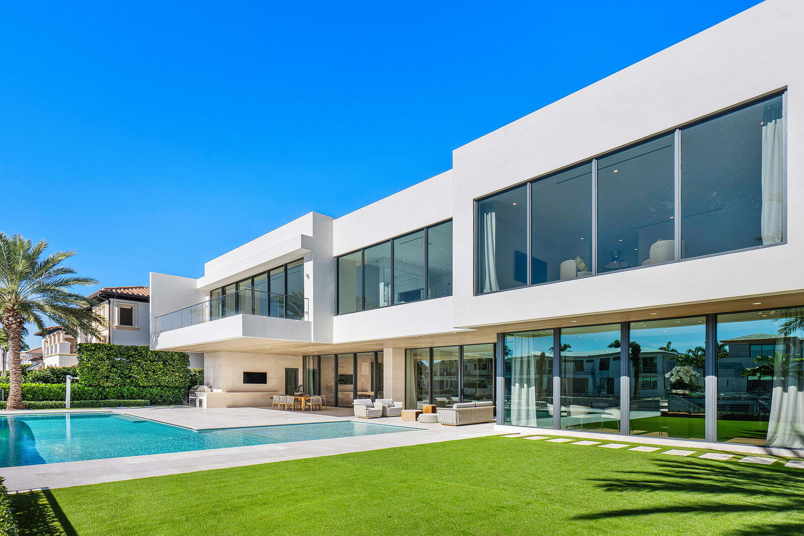 224 West Key Palm Road Boca Raton, FL 33432 - Photo 21 of 101 a view of a building with a swimming pool