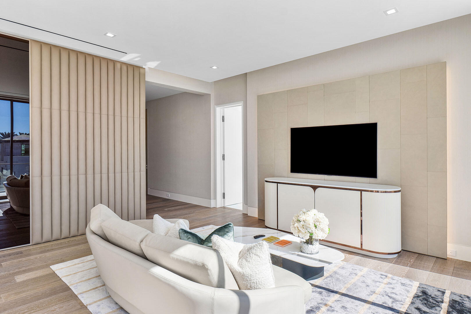 224 West Key Palm Road Boca Raton, FL 33432 - Photo 54 of 101 a living room with furniture and a flat screen tv