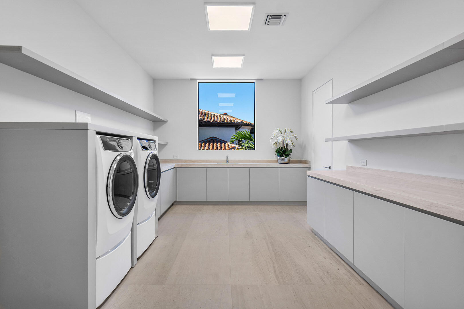 224 West Key Palm Road Boca Raton, FL 33432 - Photo 74 of 101 a utility room with sink dryer and washer