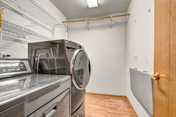 a utility room with dryer and washer