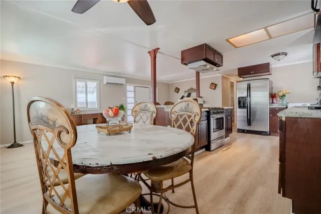 a view of a dining room with furniture