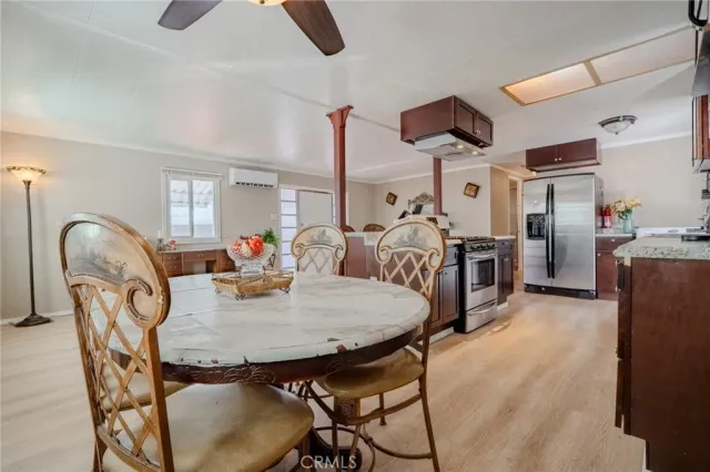 a view of a dining room with furniture