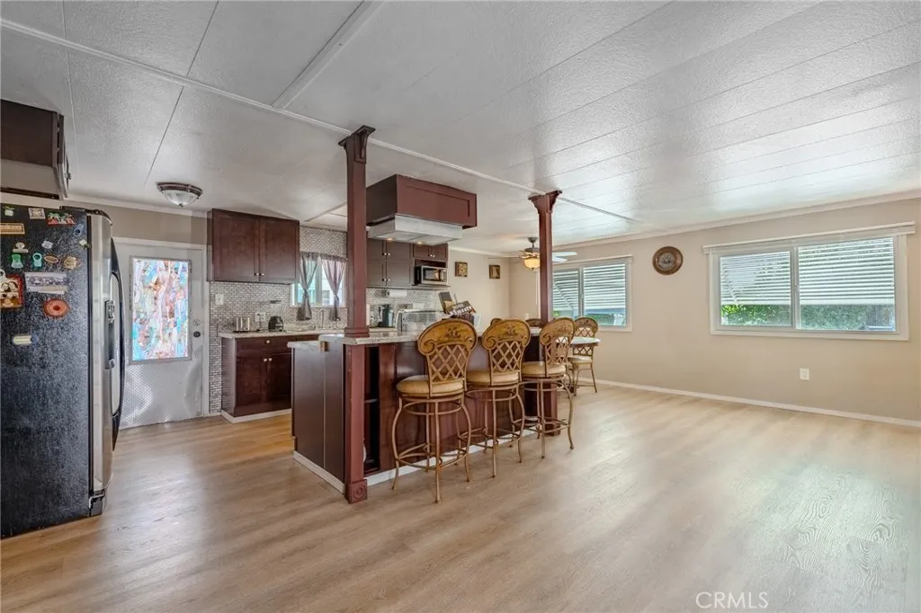 9340 Foothill, Unit 68 Rancho Cucamonga, CA 91730 - Photo 7 of 30 a view of a kitchen and dining room