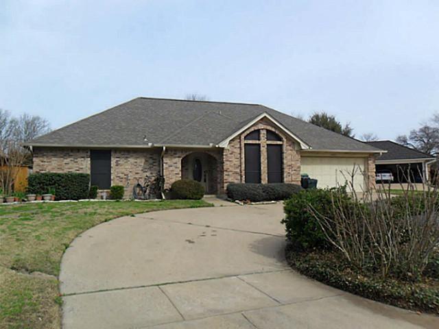 1007 Chasemore Drive Mansfield, TX 76063 - Photo 1 of 1 a front view of a house with a garden