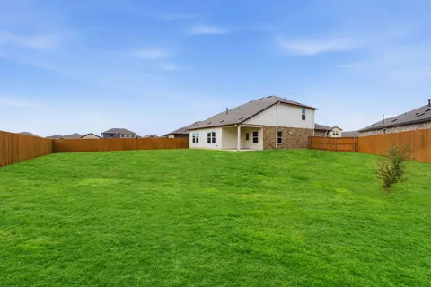a house view with a garden space