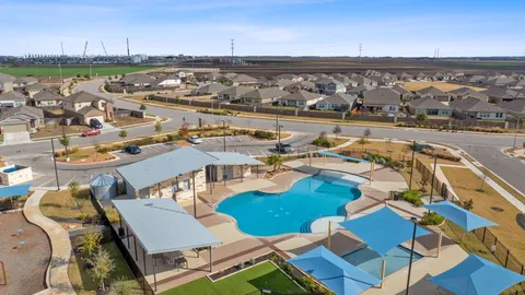 a view of a balcony with chairs